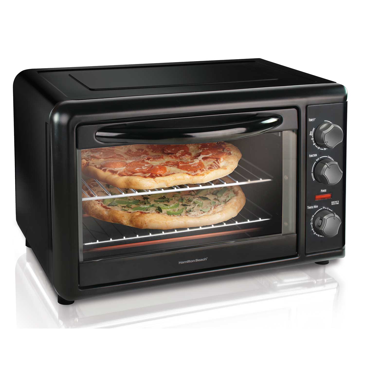 Hamilton Beach 31101D black countertop oven shown from the front with two pizzas staged on separate racks.