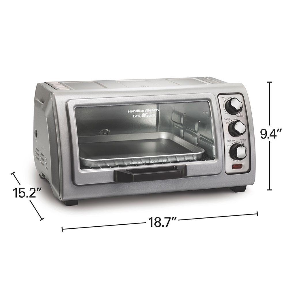 Silver Hamilton Beach Easy Reach 31127J toaster oven with roll-top door, glass front and three manual control dials; manufacturer dimension arrows are visible.