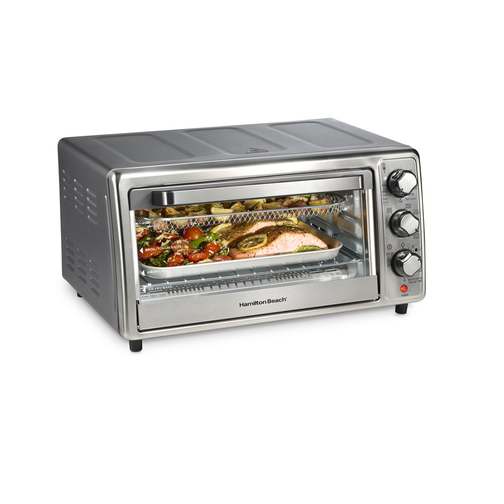 Hamilton Beach 6 Slice Sure-Crisp Air Fry Oven 31418JN in a three-quarter front view, showing its control dials and single oven cavity